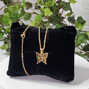Gold Stainless Steel Butterfly Charm Pendant on a 1chChain Necklace